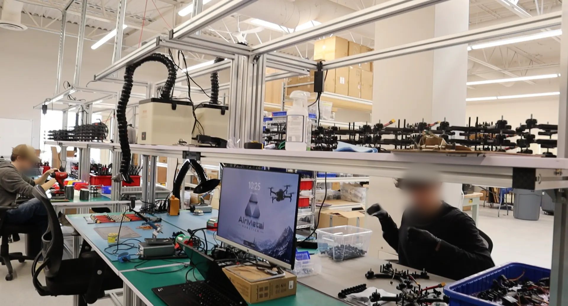 AirMetal Robotics technicians building unmanned systems and tactical mesh payloads in Kanata, Ontario